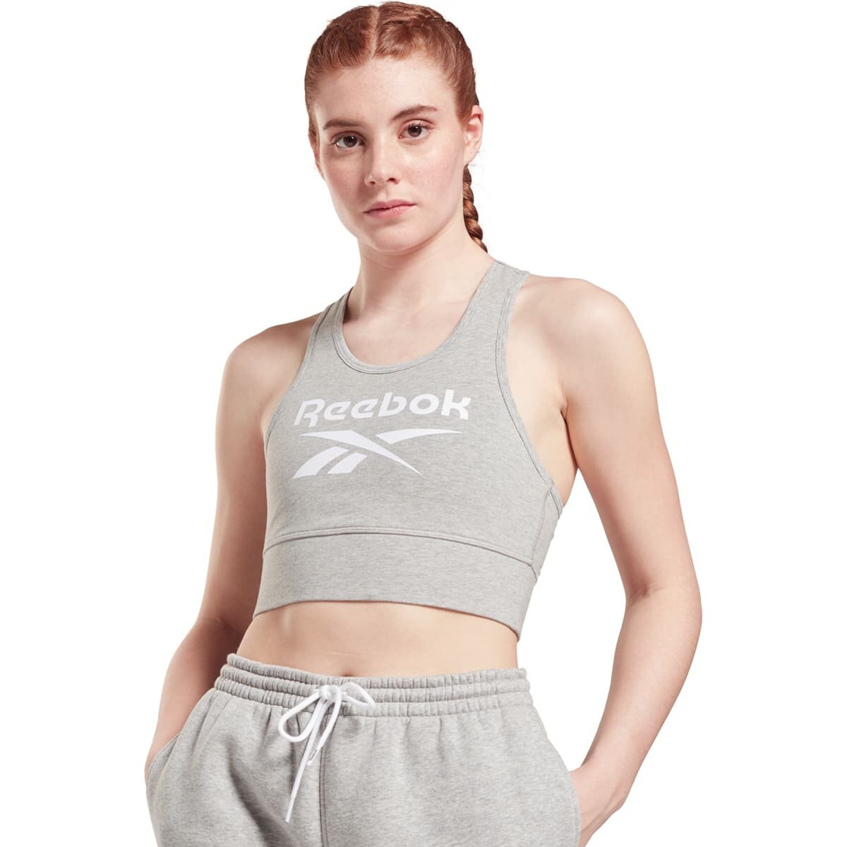 Top deportivo mujer online reebok