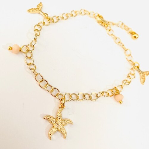 Pulsera con Estrella y Cola de Delfin-Baño de Oro 18K -Dorado.