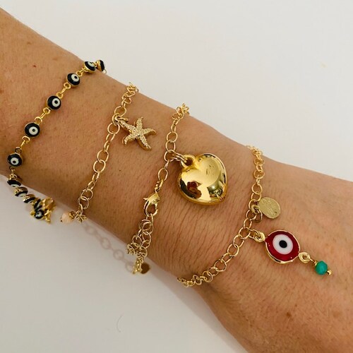 Pulsera con Estrella y Cola de Delfin-Baño de Oro 18K -Dorado.