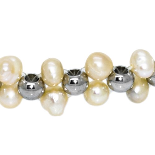 Pulsera de perlas combinada con bolas en acero