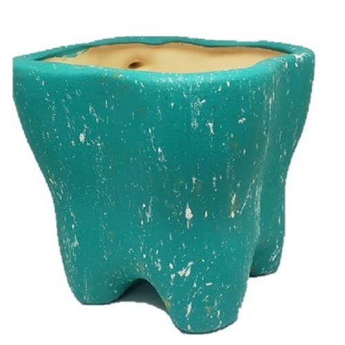 Taza en forma de muela