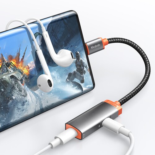 Adaptador USB Tipo C 2 en 1 Carga y Transmite Audio .