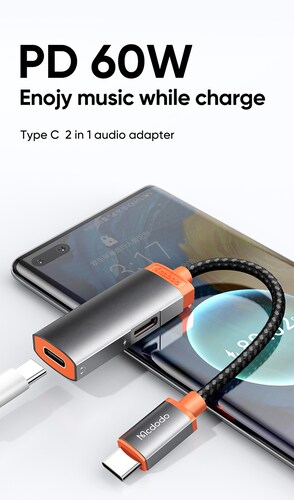 Adaptador USB Tipo C 2 en 1 Carga y Transmite Audio .