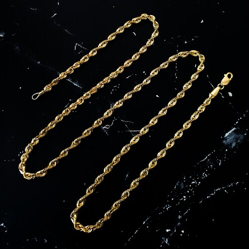 Cadena de hombre Oro de 10k Italiano, tejido torzal. Incluye certificado y caja de regalo.