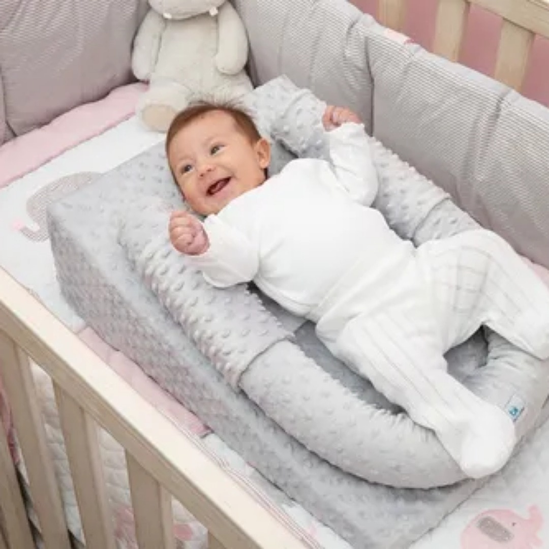 Cojin soporte best sale para bebe