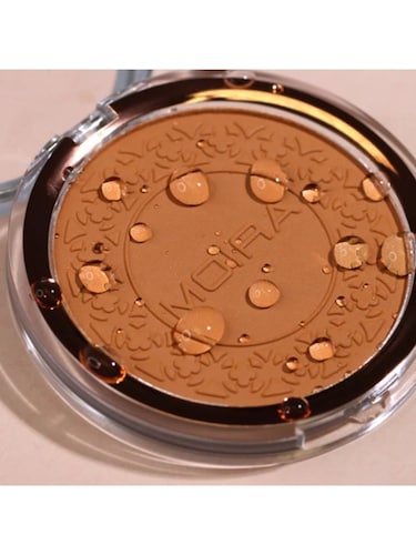 Polvo compacto a prueba de agua Moira Cosmetics Deep