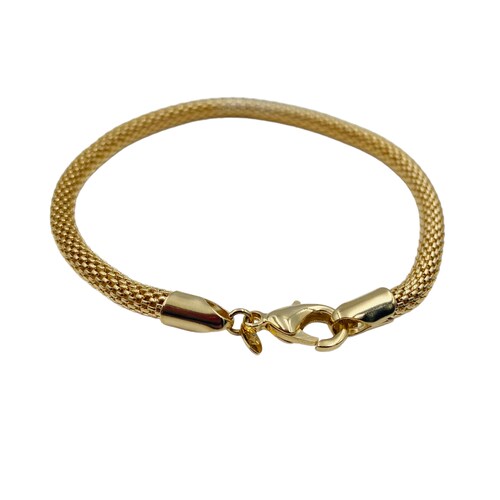 Pulsera Gruesa- Baño de oro 18K.