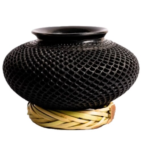 Nigua mediana calada, gota, elaborada en Barro Negro.