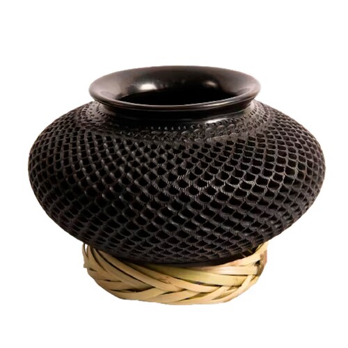 Nigua mediana calada, gota, elaborada en Barro Negro.