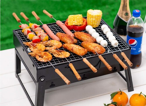 Parrilla Asador de carbon portatil.