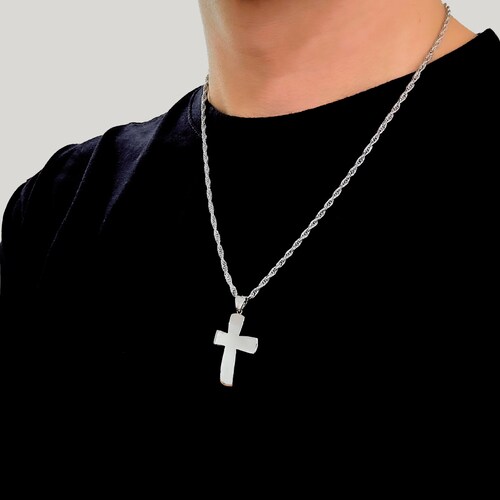 Cadena torzal y cruz de plata .925 con baño de rodio.