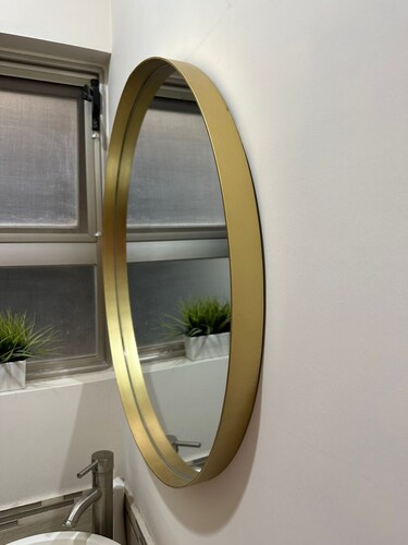 Espejo redondo con marco de metal de 80cm dorado