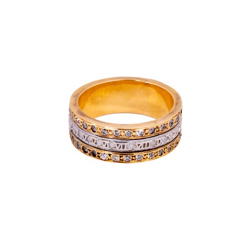 Anillo Giratorio Números Romanos con Circonia 2 Oros 14 Kilates..