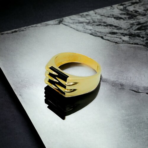 Anillo oro 10k piedra ónix de garra .