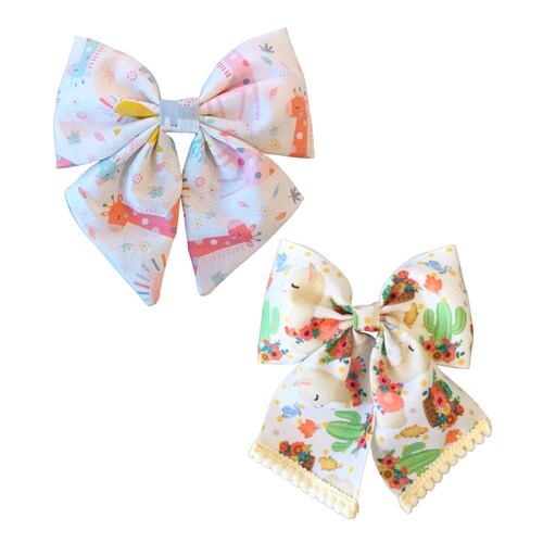 Par de moños  Cutie Bow Deluxe, Cute as a Bug, hermosos moños.  