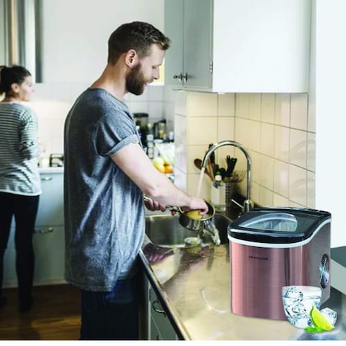 Máquina productora hacedora de hielo hasta 14 kg al día acero inoxidable .