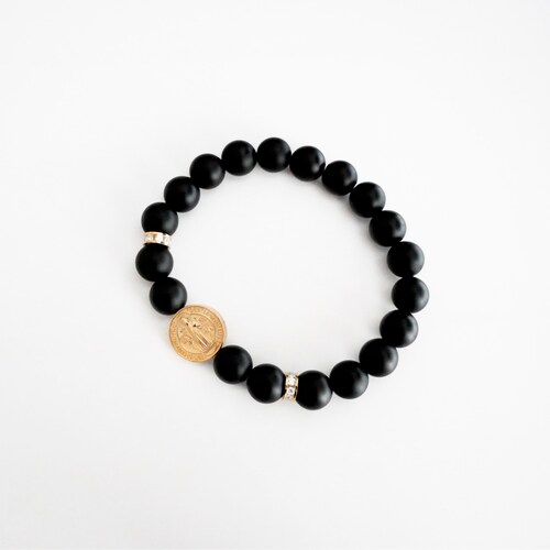 Pulsera San Benito de Oro 10k.