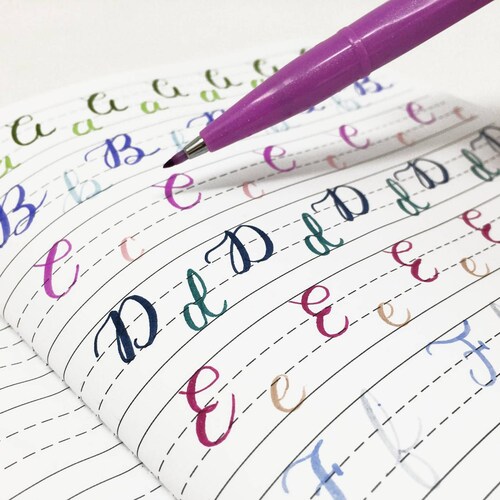 Altamira Libreta Lettering Morada Con Set Brush Pen Pastel 