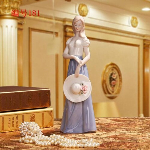 Figura de porcelana mujer MXMWP-001-3 1pza 12x30x12cm Frente x Alto x Fondo Porcelana Artesanal MadameRousseau