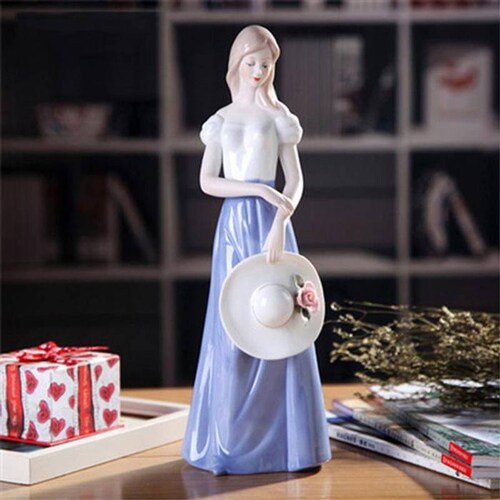 Figura de porcelana mujer MXMWP-001-3 1pza 12x30x12cm Frente x Alto x Fondo Porcelana Artesanal MadameRousseau