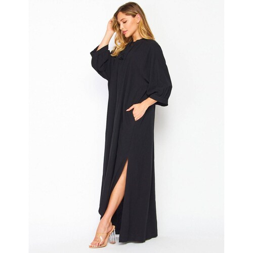 Vestido oversize negro con bolsas 