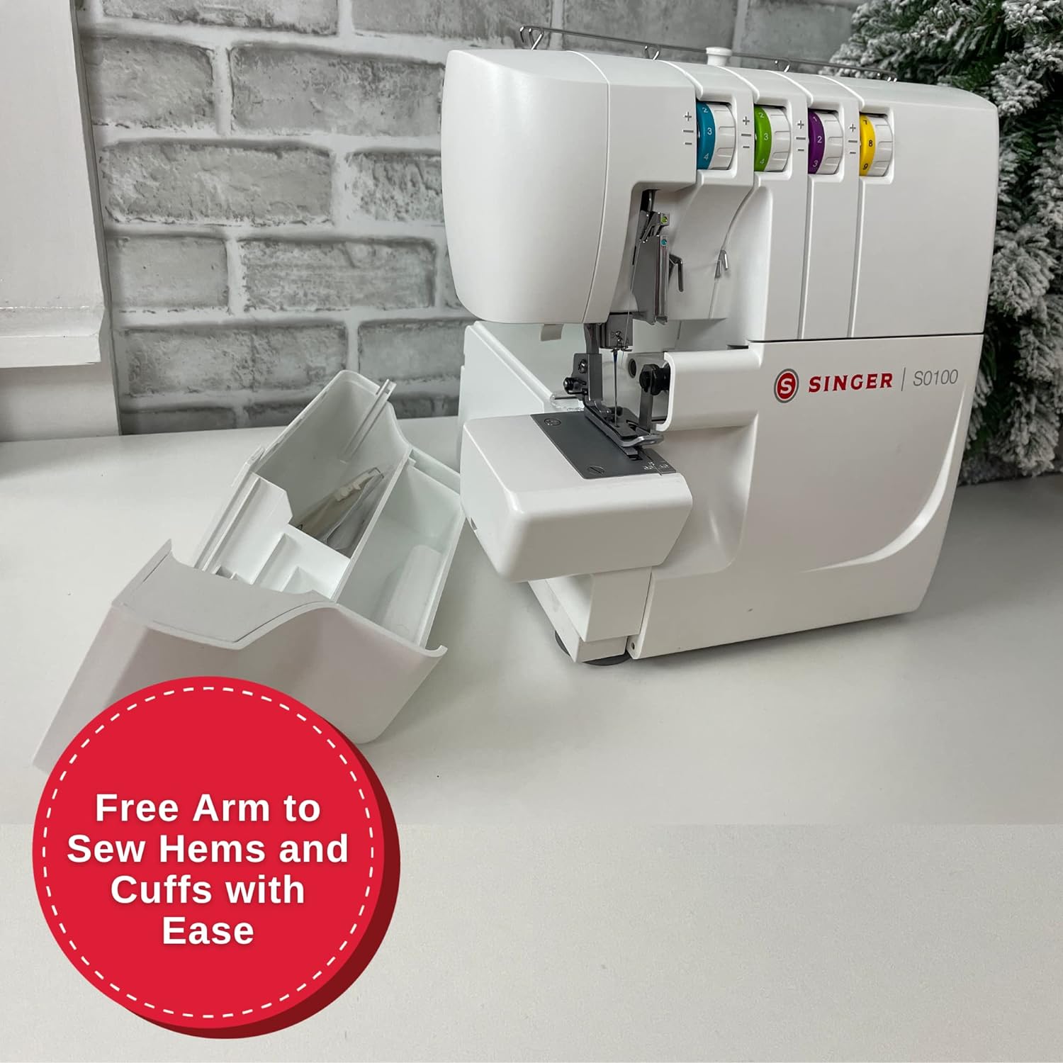 Maquina de coser overlock 4 hilos marca singer s0105.
