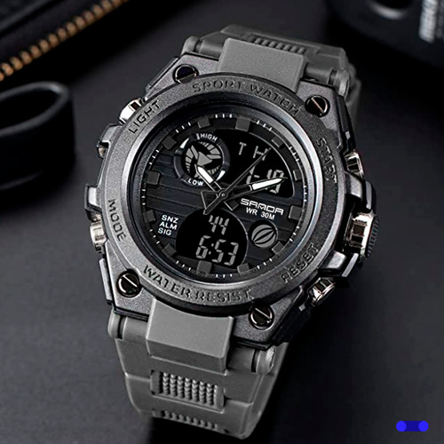 Reloj de pulsera Sanda top tean 739 de cuerpo color negro, analógico-digital, para hombre, fondo negro, con correa de poliuretano color negro, agujas color negro y blanco, dial negro, subesferas color negro y gris, minutero/segundero blanco, bisel color negro, luz celeste y hebilla simple