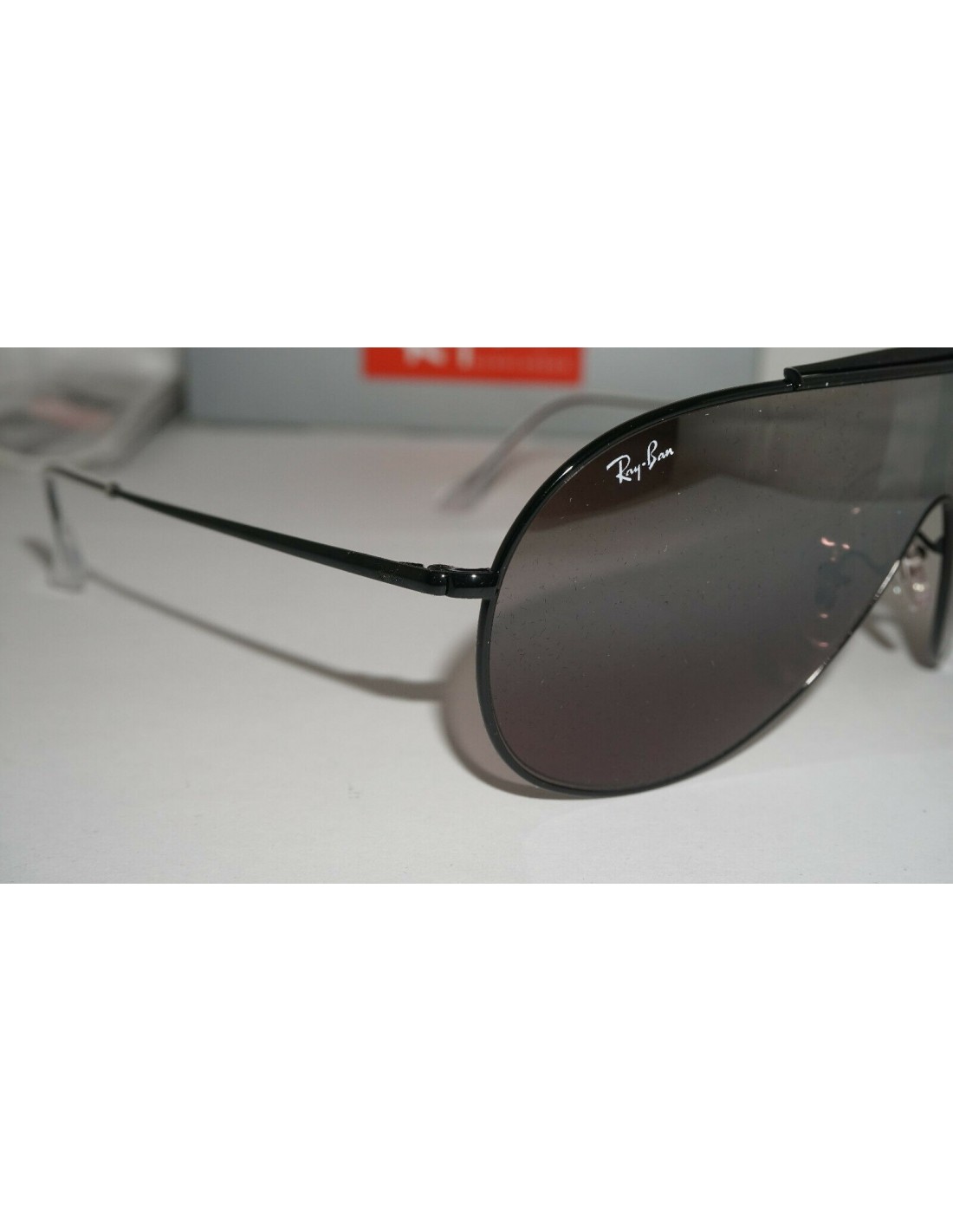 Lentes de sol Ray Ban Rb3597 9168Y3 Wings I Plata Espejo Degradado Negro