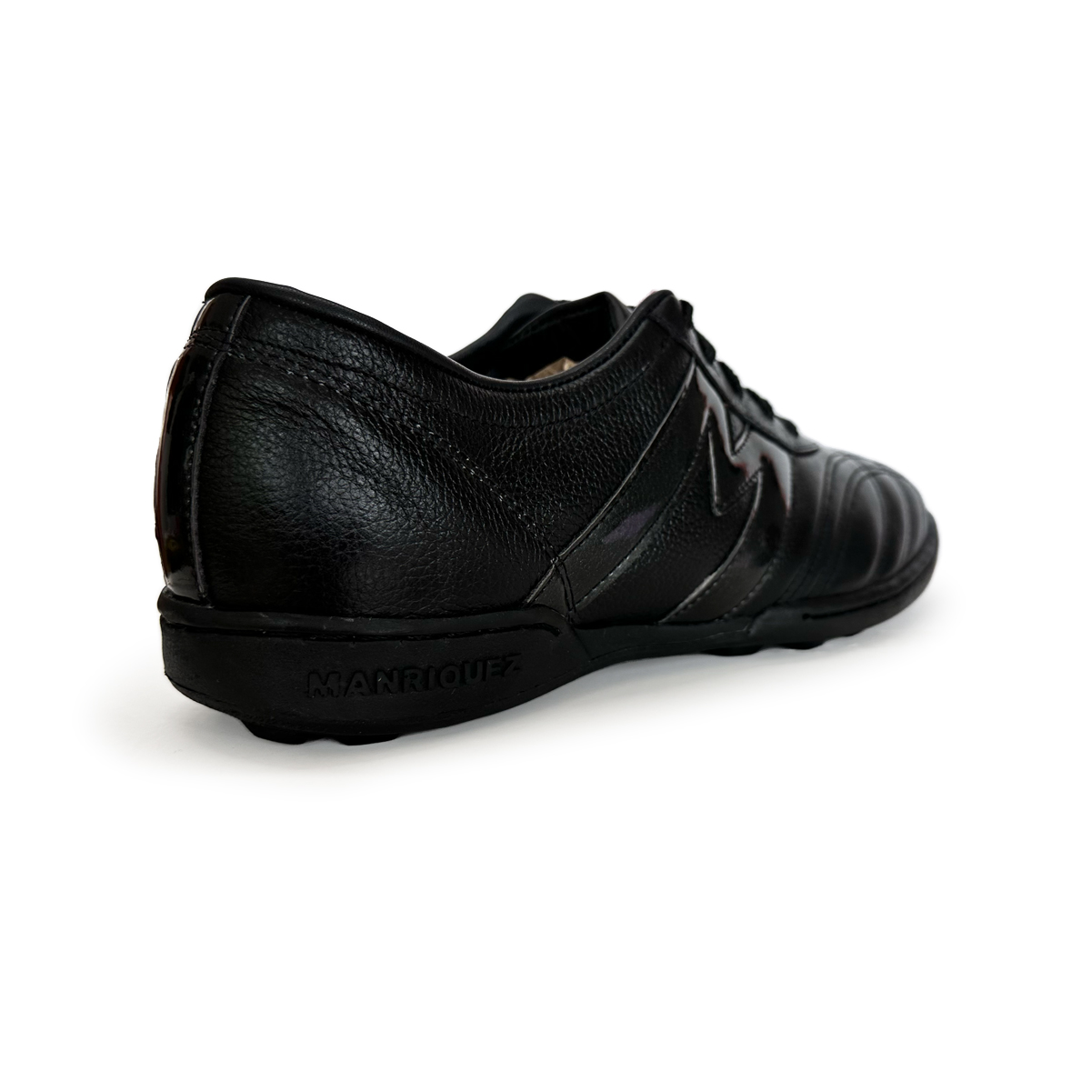 Tenis de futbol Rápido MANRIQUEZ Mid TM Total Negro.