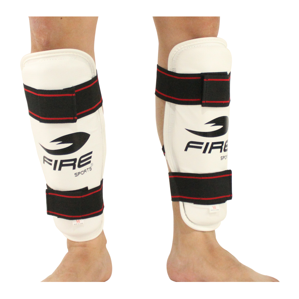 PAR DE ESPINILLERAS FIRE SPORTS PARA TAEKWONDO T-XG.