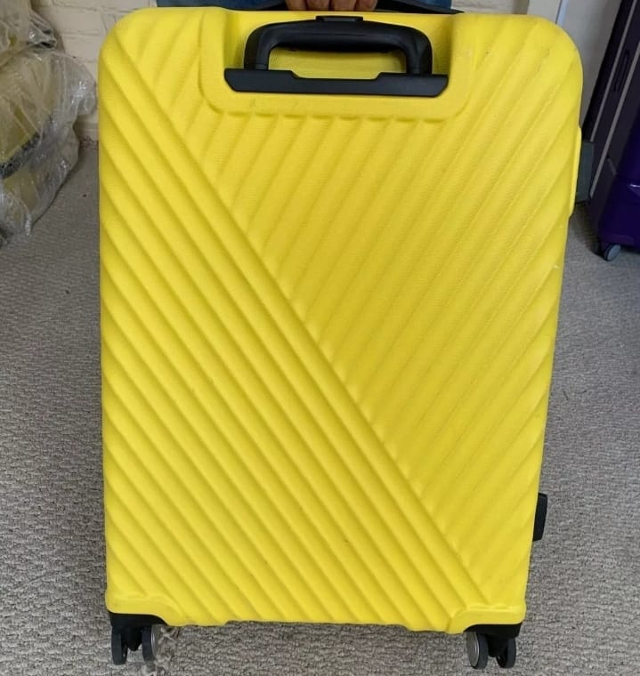 Maleta American Tourister Frisbee 76/28 Color Amarillo.