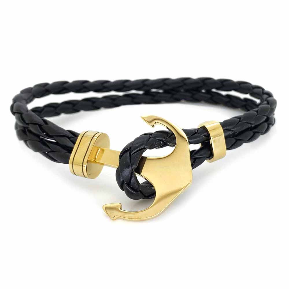 Pulsera Acero NK de piel trenzada con ancla dorada.