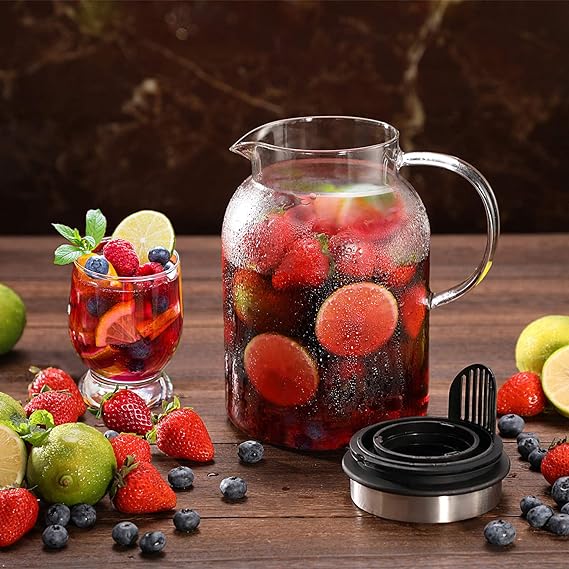 A Jarra de agua con infusor de frutas de vidrio con tapa extraíble, jarra de infusión de alta resistencia al calor para agua fría/caliente, bebidas con infusión de sabor y té helado, 2 cuartos de galón.