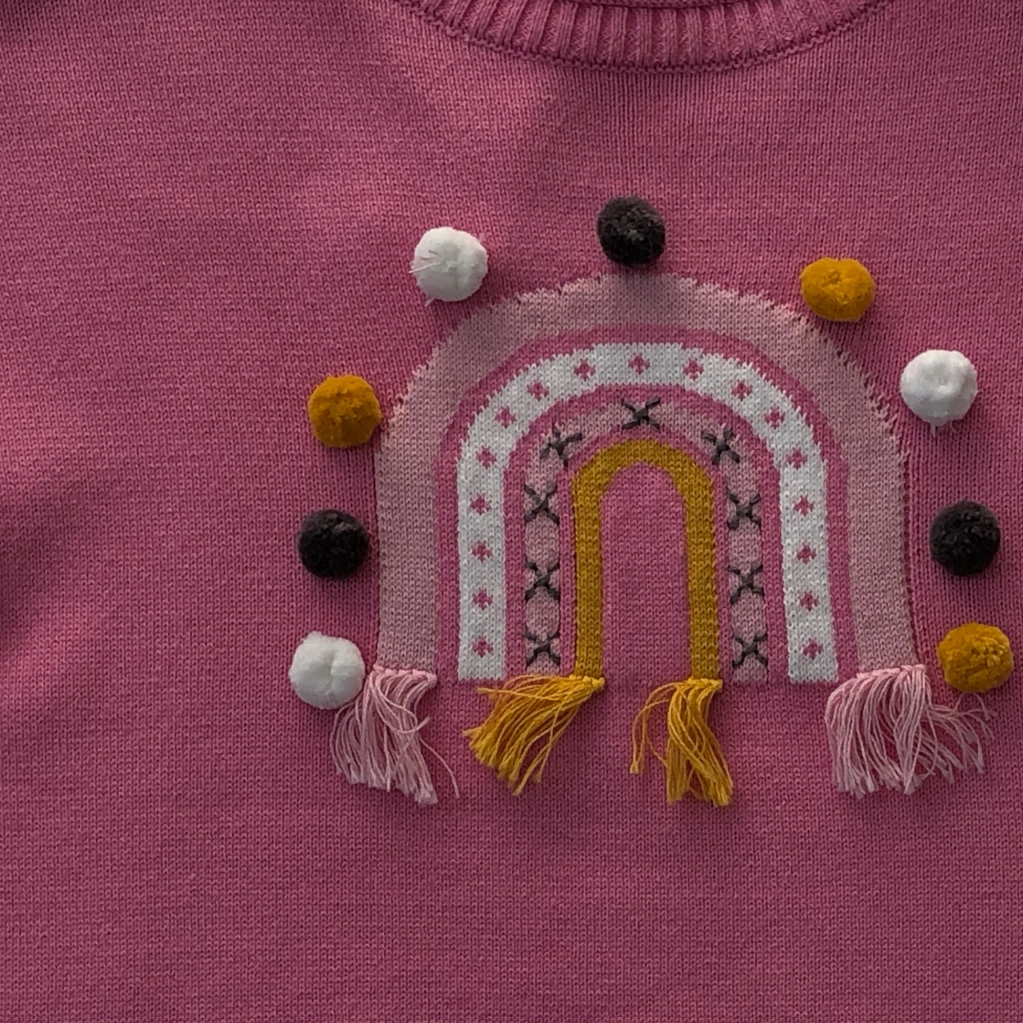 Suéter rosa arcoíris niña Losan.