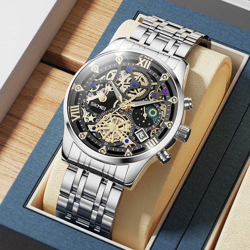 Reloj pulsera Skmei 7039 color plateado - fondo negro.