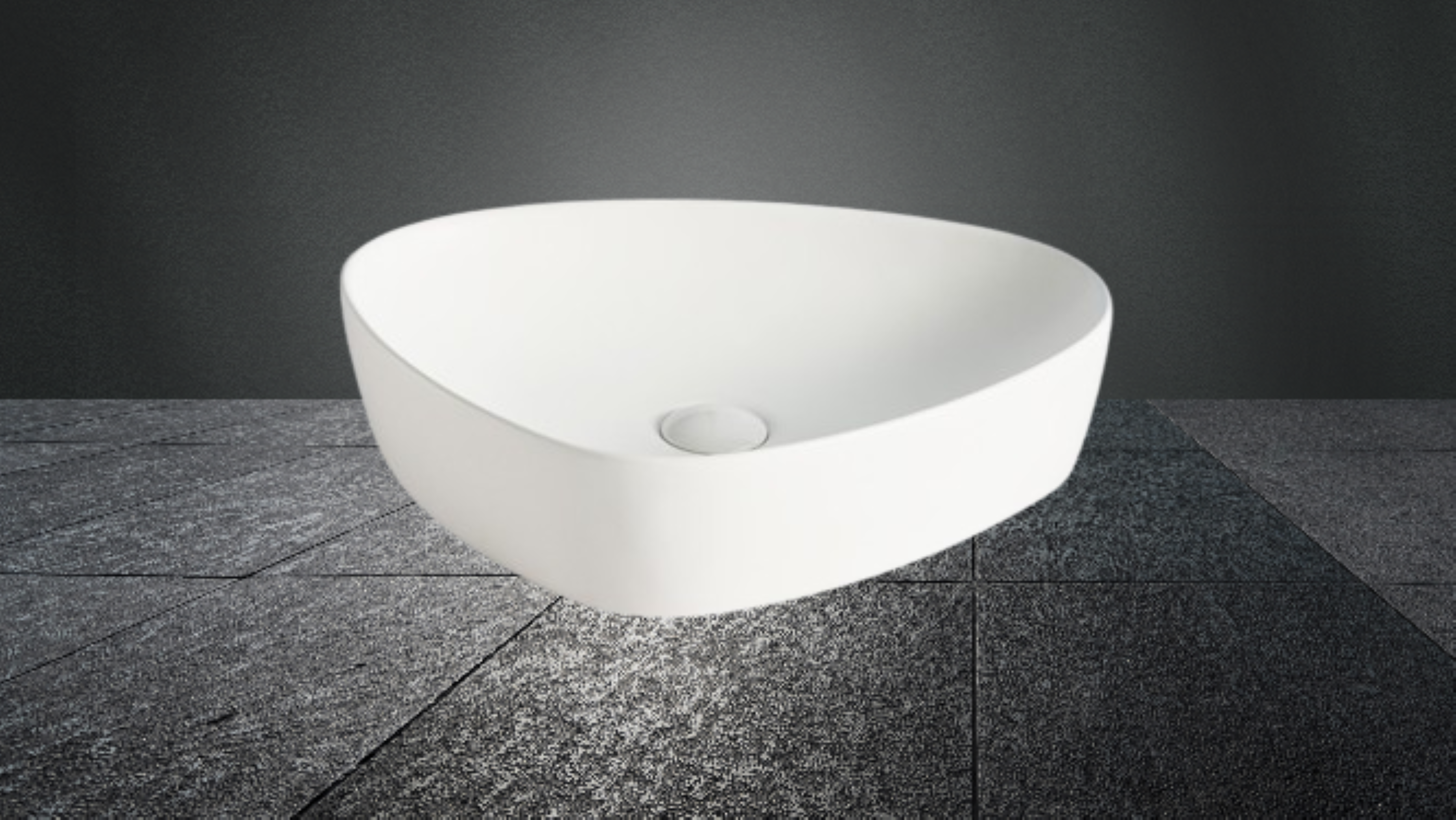 Lavabo Cerámico para Baño ARU, acabado blanco mate. De sobreponer, con diseño europeo ideal para todo tipo de baños. Dimensiones 50.0 x 40.5 x 12.0 cms. (base x altura x profundidad)