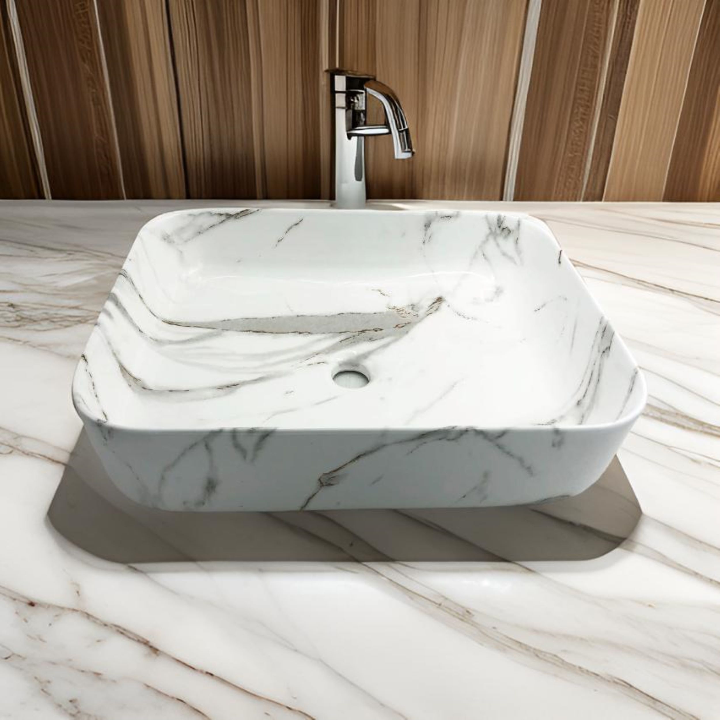 Lavabo Cerámico para Baño TIM, forma rectangular acabado blanco marmoleado. De sobreponer, con diseño europeo ideal para todo tipo de baños. Dimensiones 50.0 x 39.0 x 13.0 cms. (base x altura x profundidad)