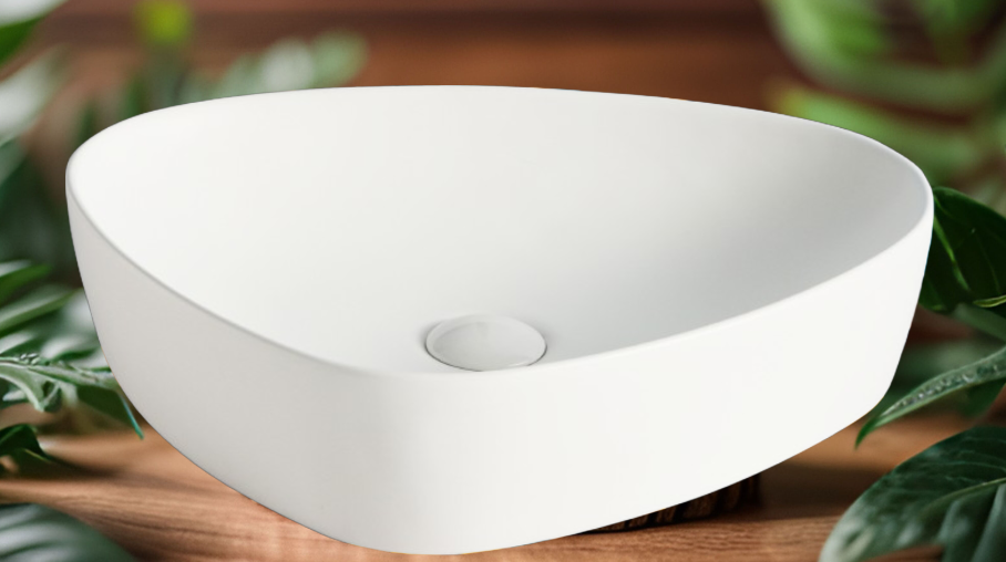 Lavabo Cerámico para Baño ARU, acabado blanco mate. De sobreponer, con diseño europeo ideal para todo tipo de baños. Dimensiones 50.0 x 40.5 x 12.0 cms. (base x altura x profundidad)