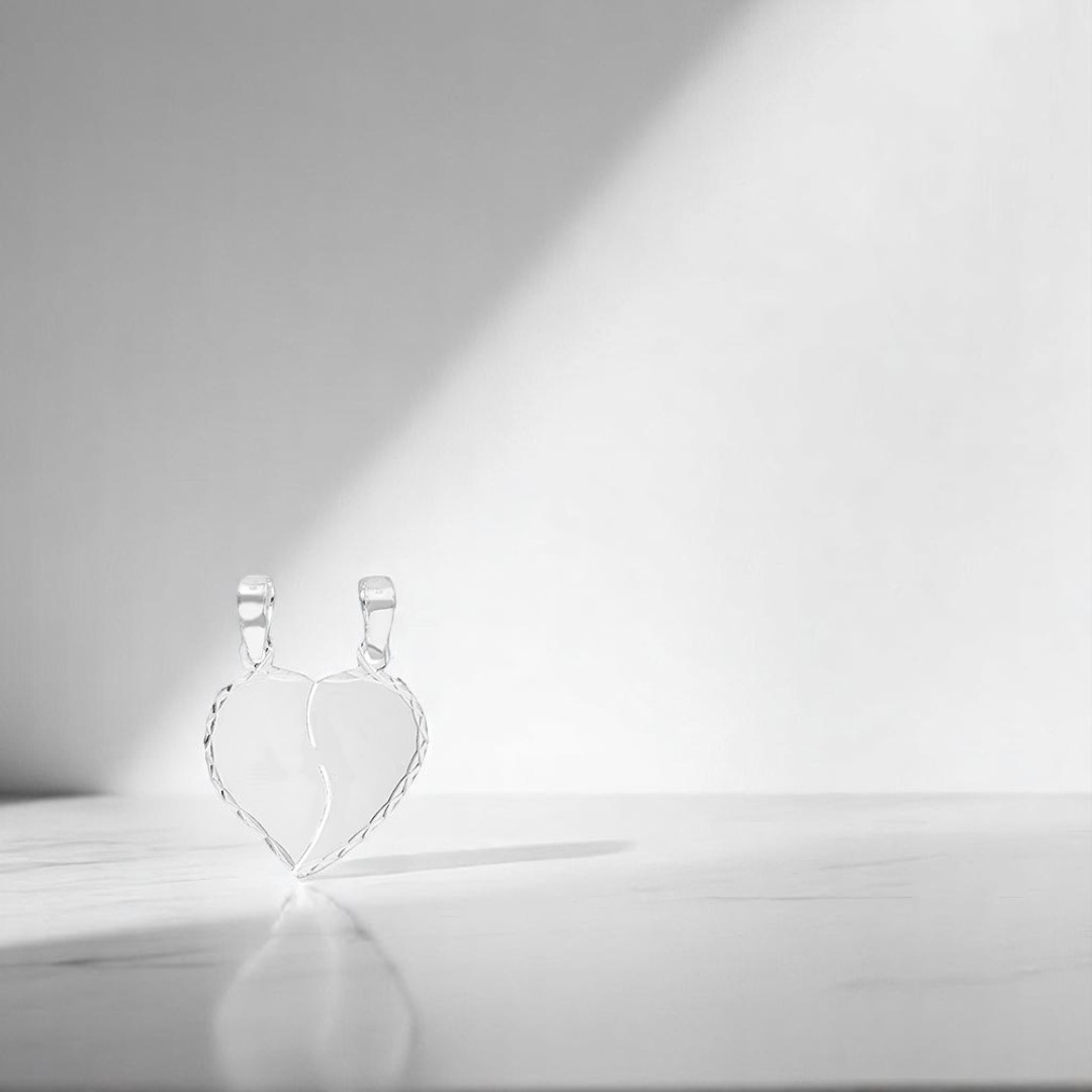 Dije Corazón Partido Liso en Plata .925